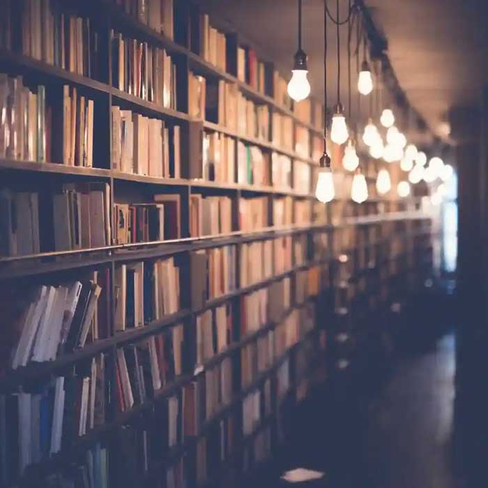 Image of books in a library for literacy quiz